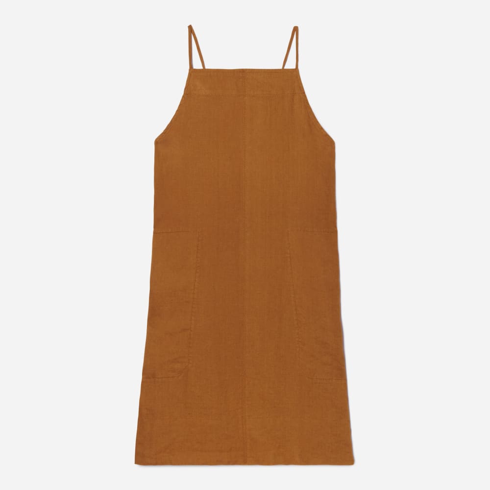 The Linen Apron Dress in Tawny Brown — front view