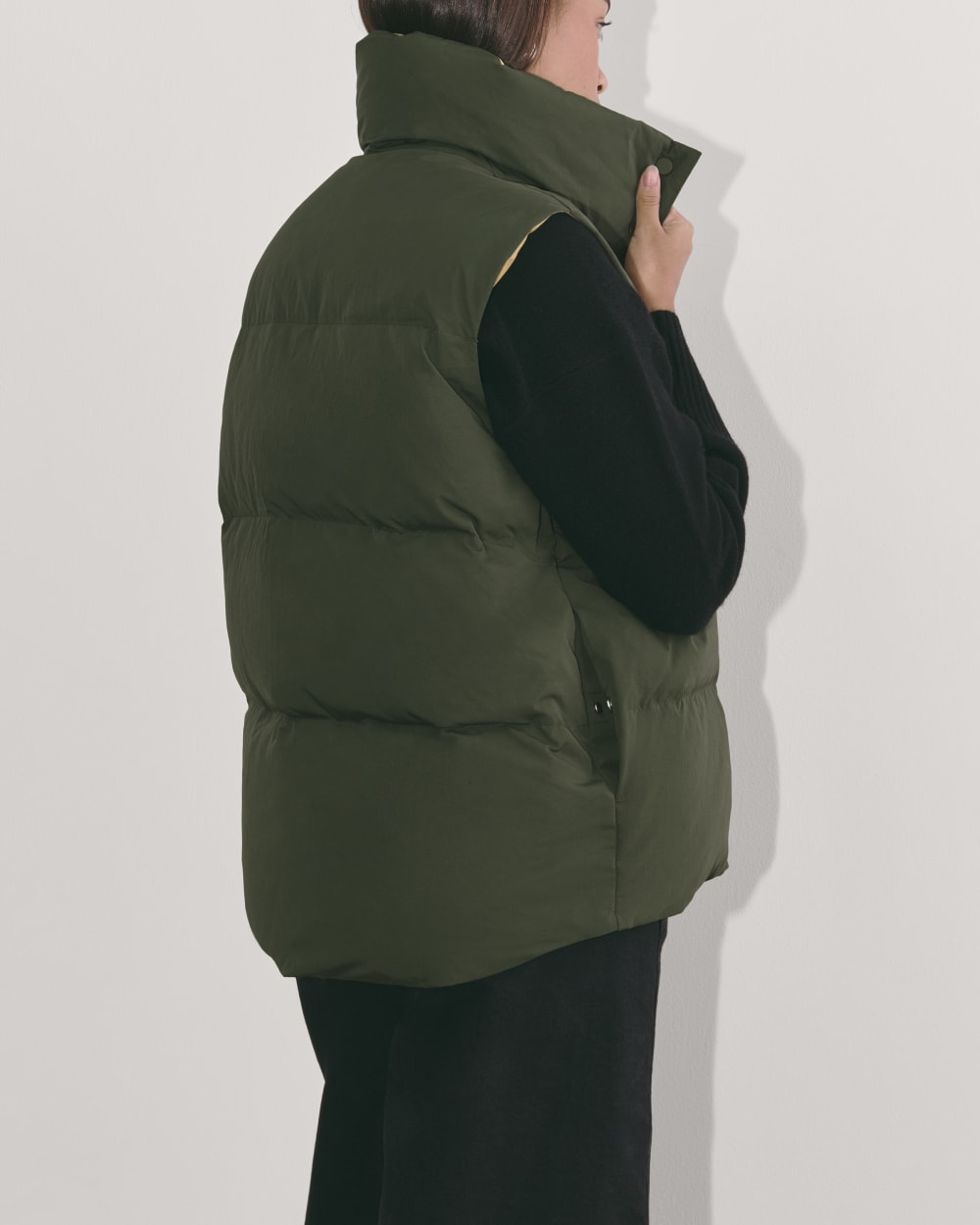 The Puffer Vest in Dark Forest — detail view