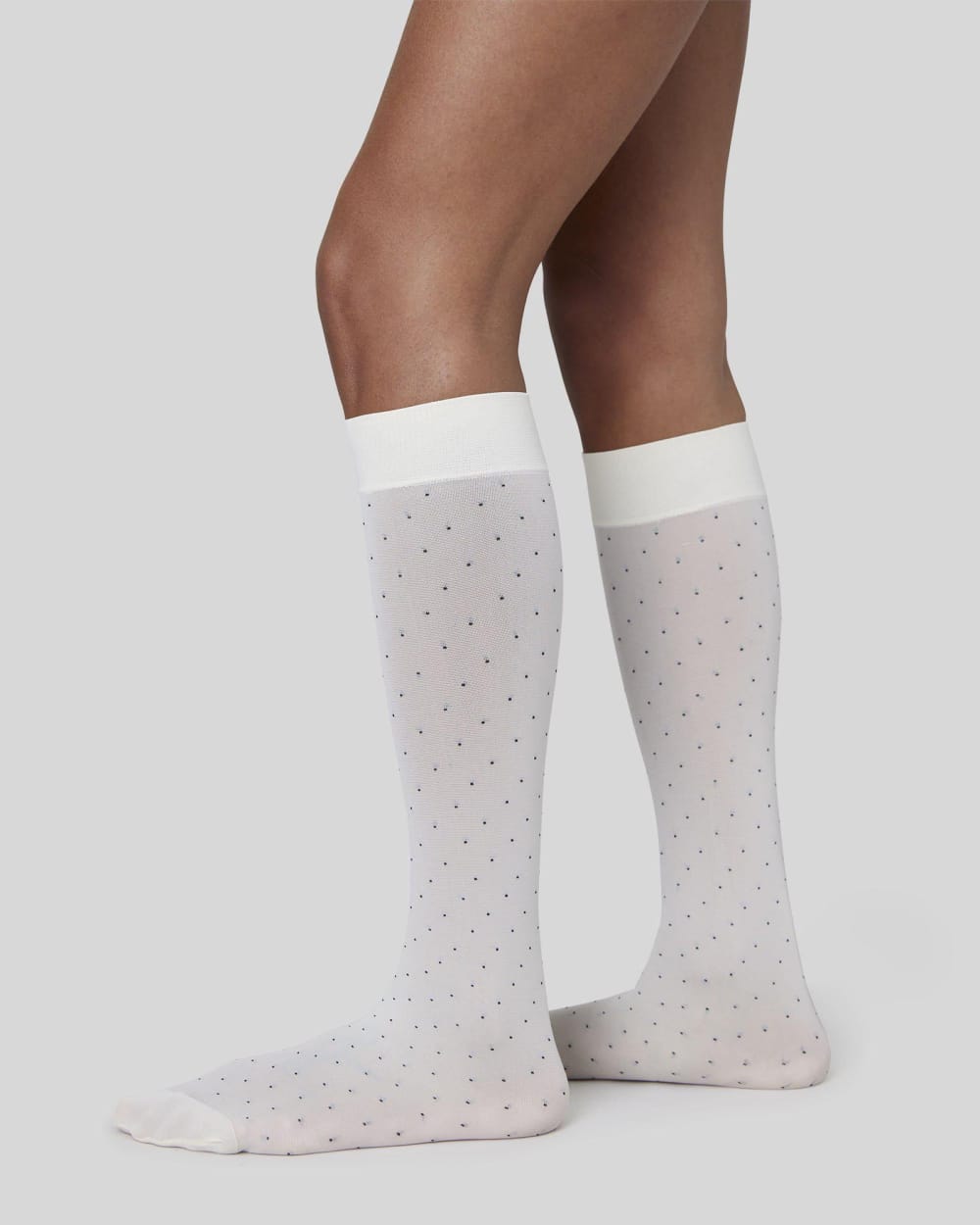 Eira Petite Dots Knee-High Socks in White — front view