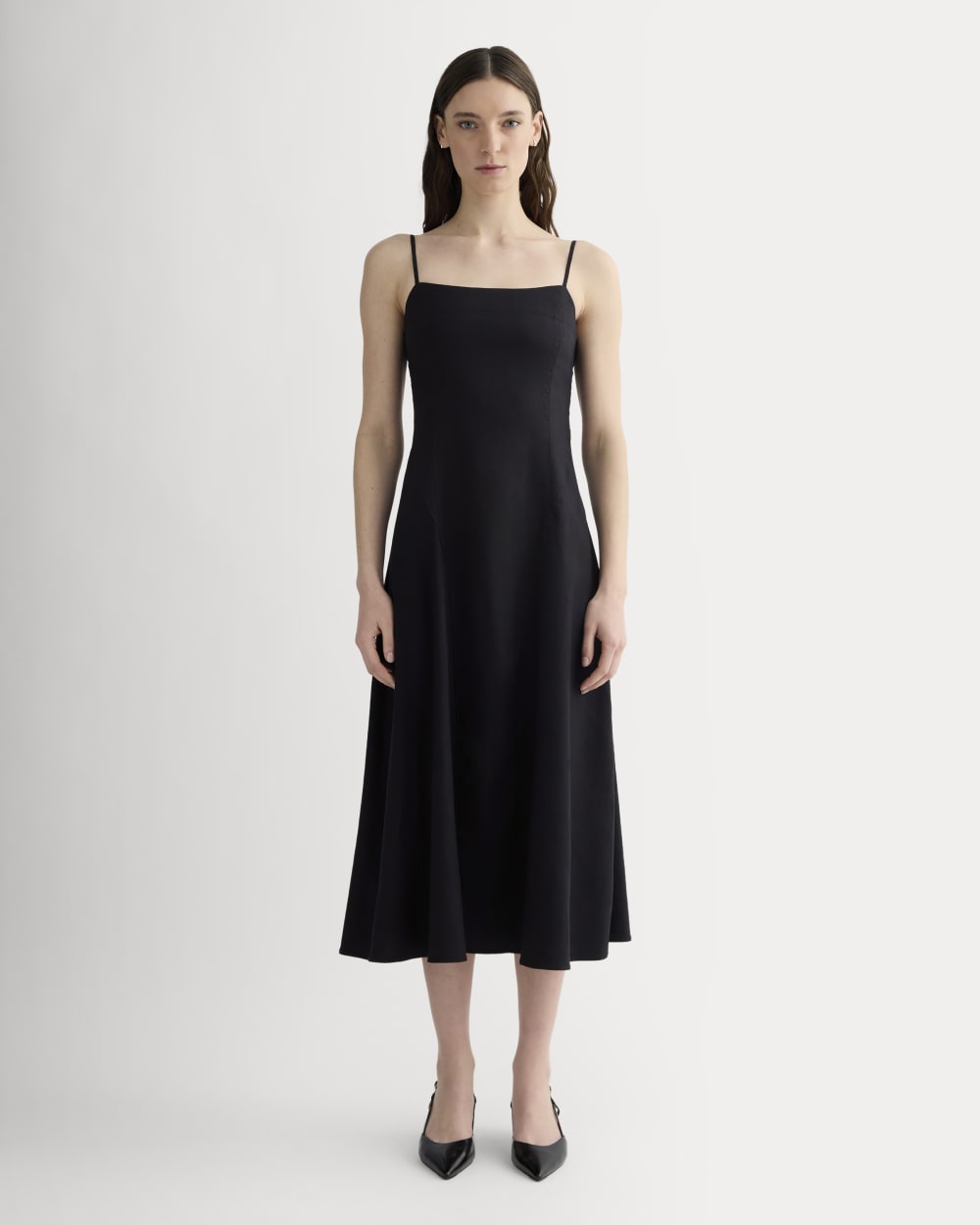 The Seamed Dress in Stretch Linen in Black — front view