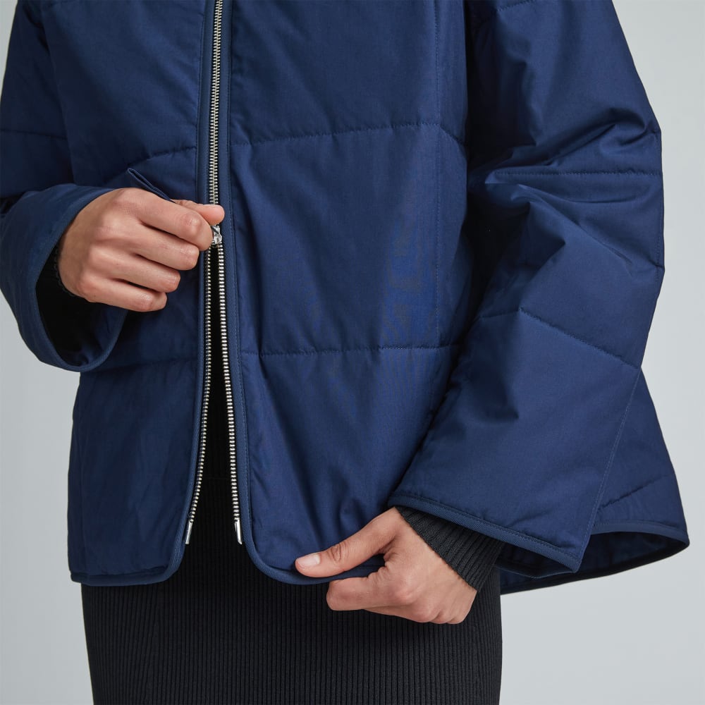 The Quilted Cotton Liner in Navy — detail view