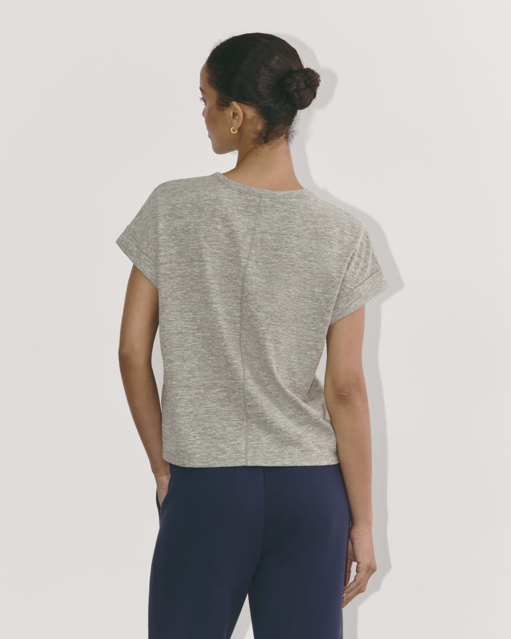 The Perform Tee in Heathered Grey / Olive — detail view