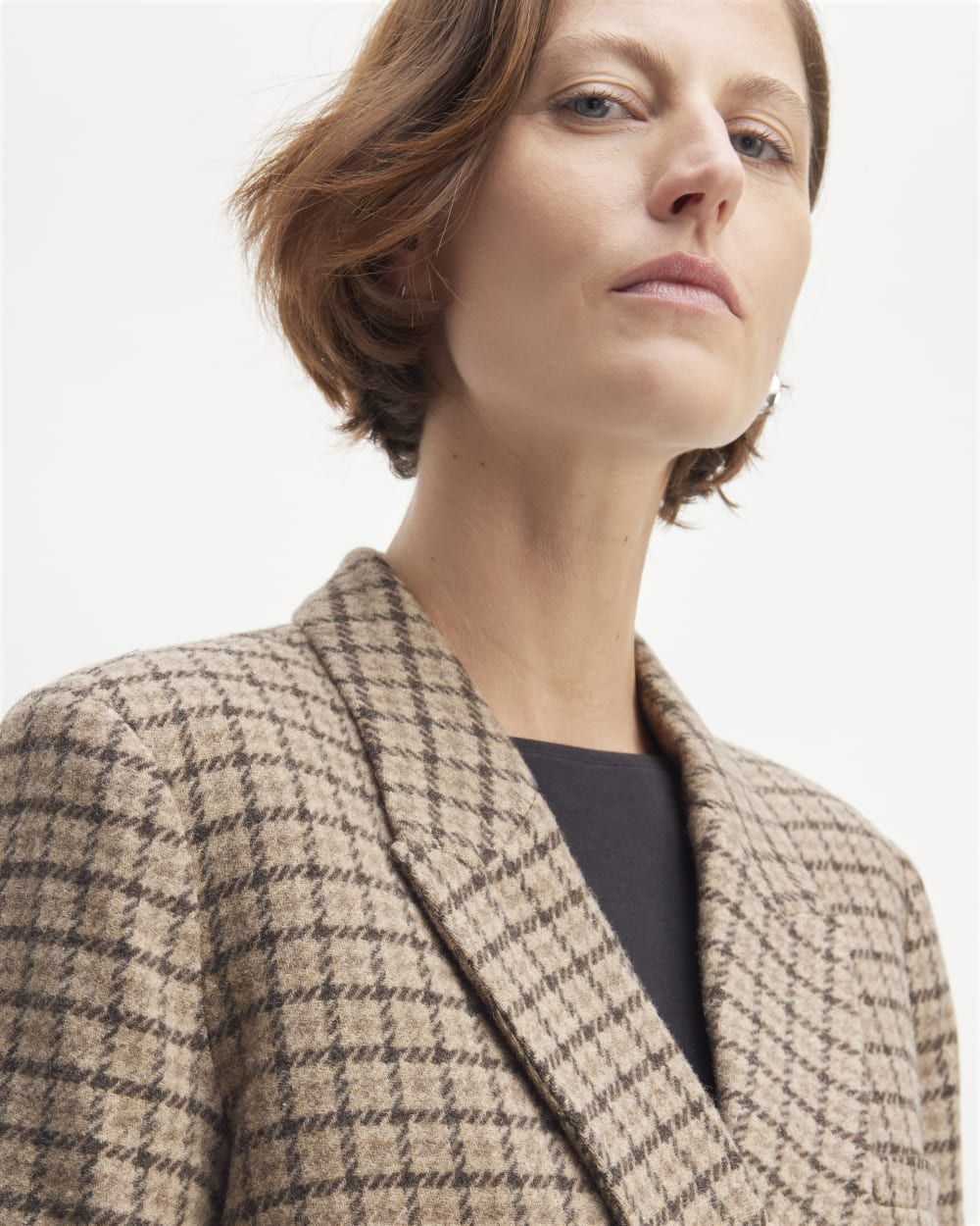 The ReWool® Double-Breasted Blazer in Beige Houndstooth — detail view