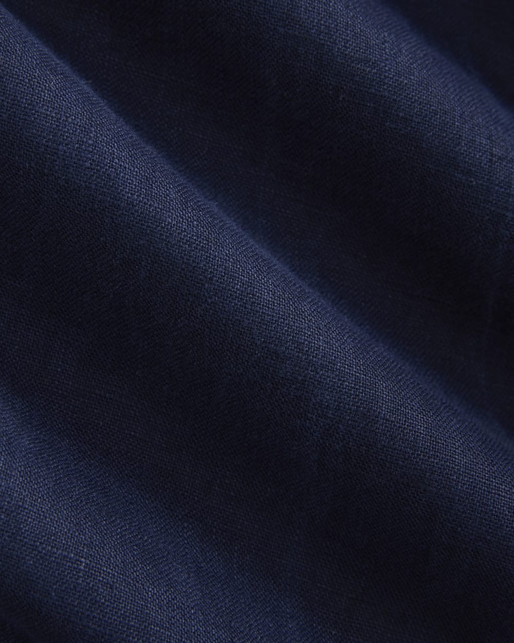 The Drawstring Pant in Linen in Navy — detail view