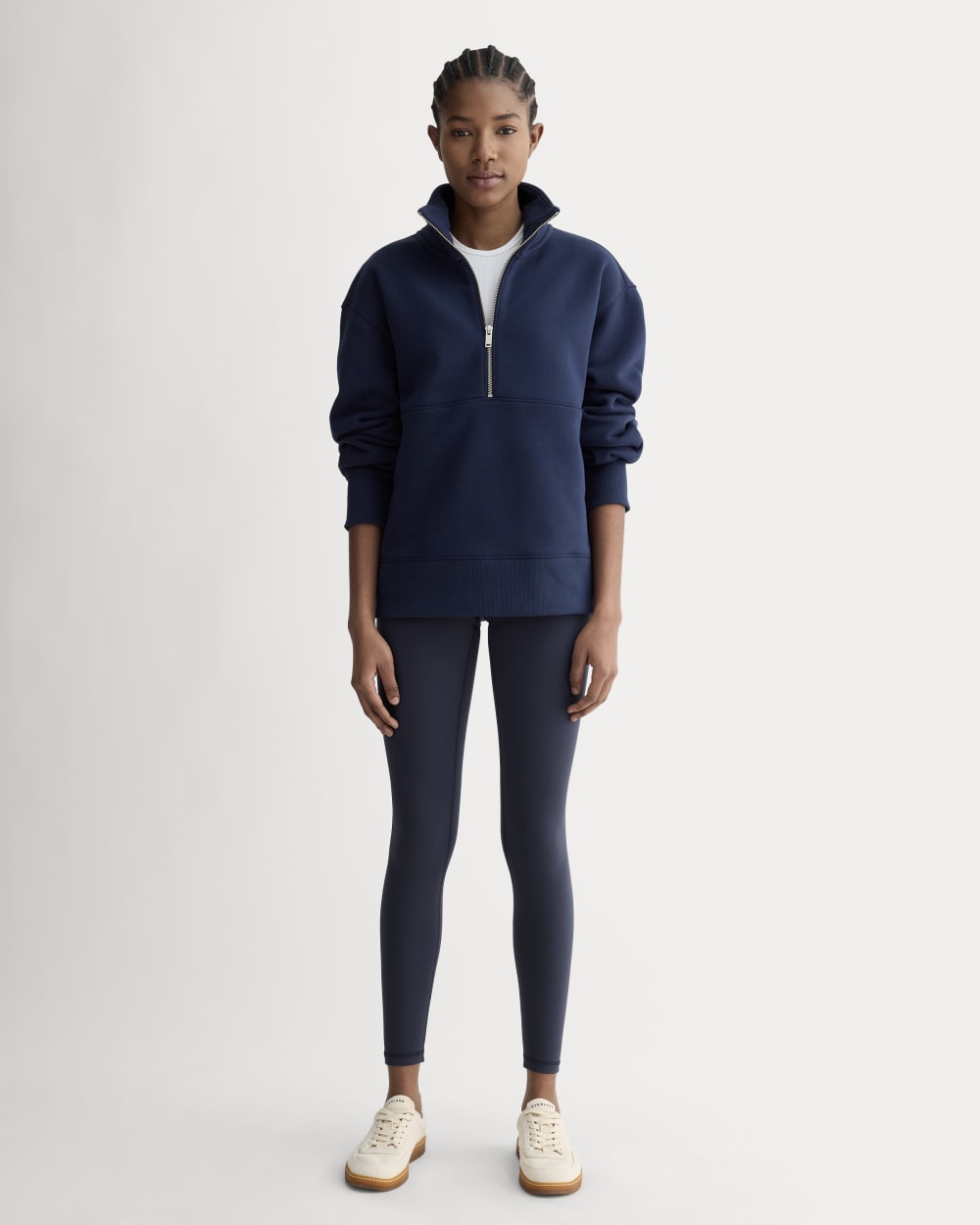The Perform 24/7 Legging in Navy — front view
