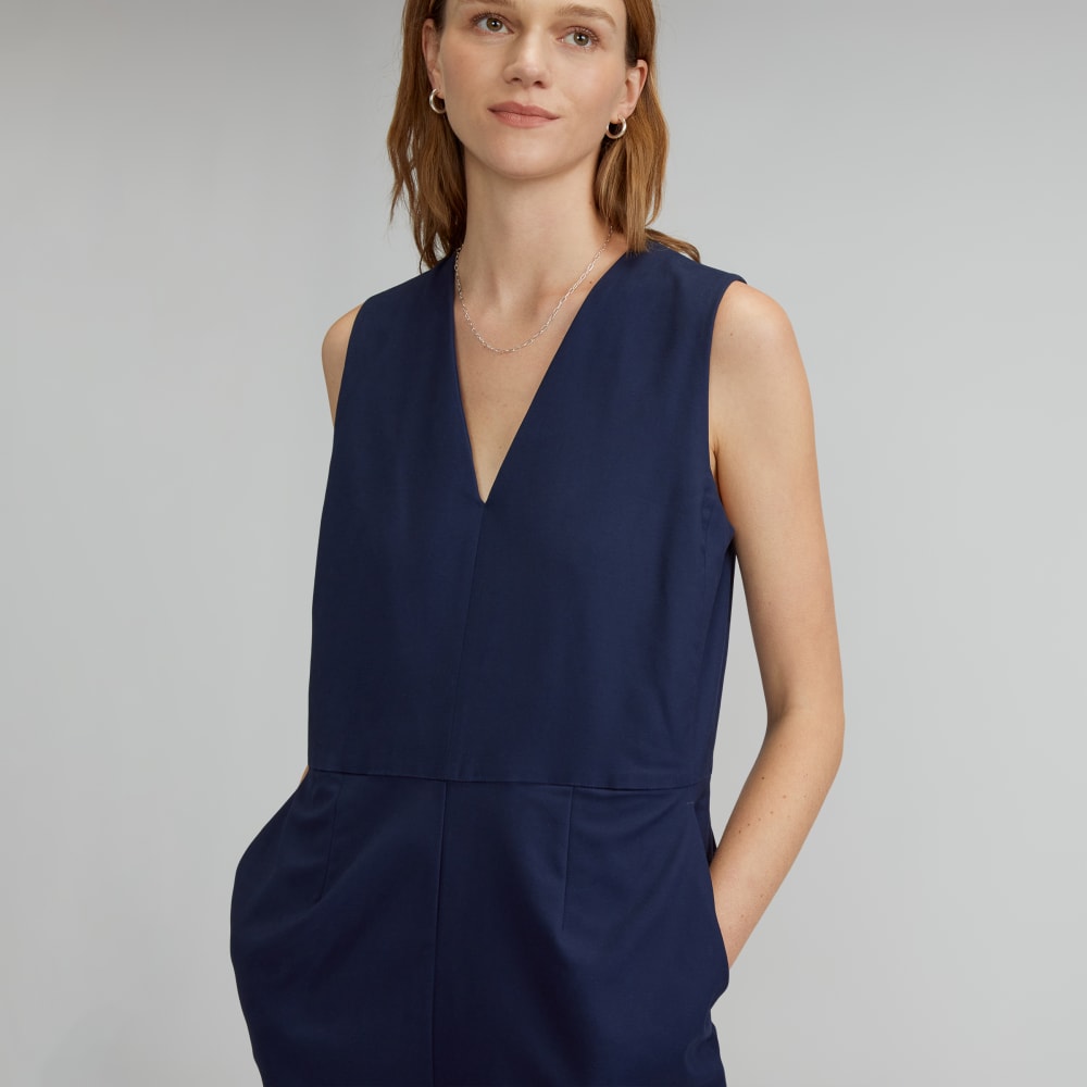 The Structured Cotton Jumpsuit in Navy — detail view