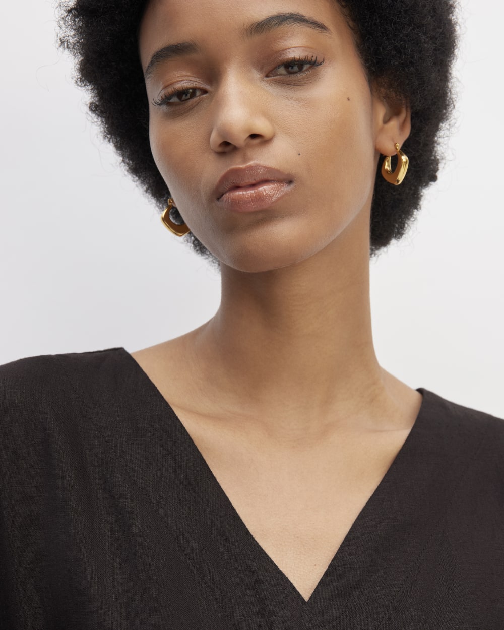 The Wrap Jumpsuit in Linen in Black — detail view