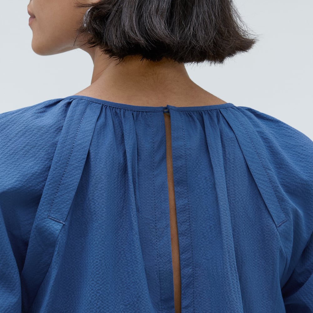 The Seersucker Puff Sleeve Dress in Deep Blue — detail view