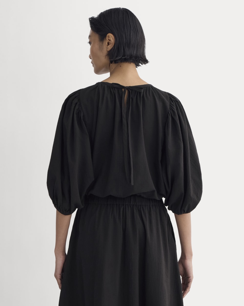 The Gauze Puff-Sleeve Top in Black — detail view