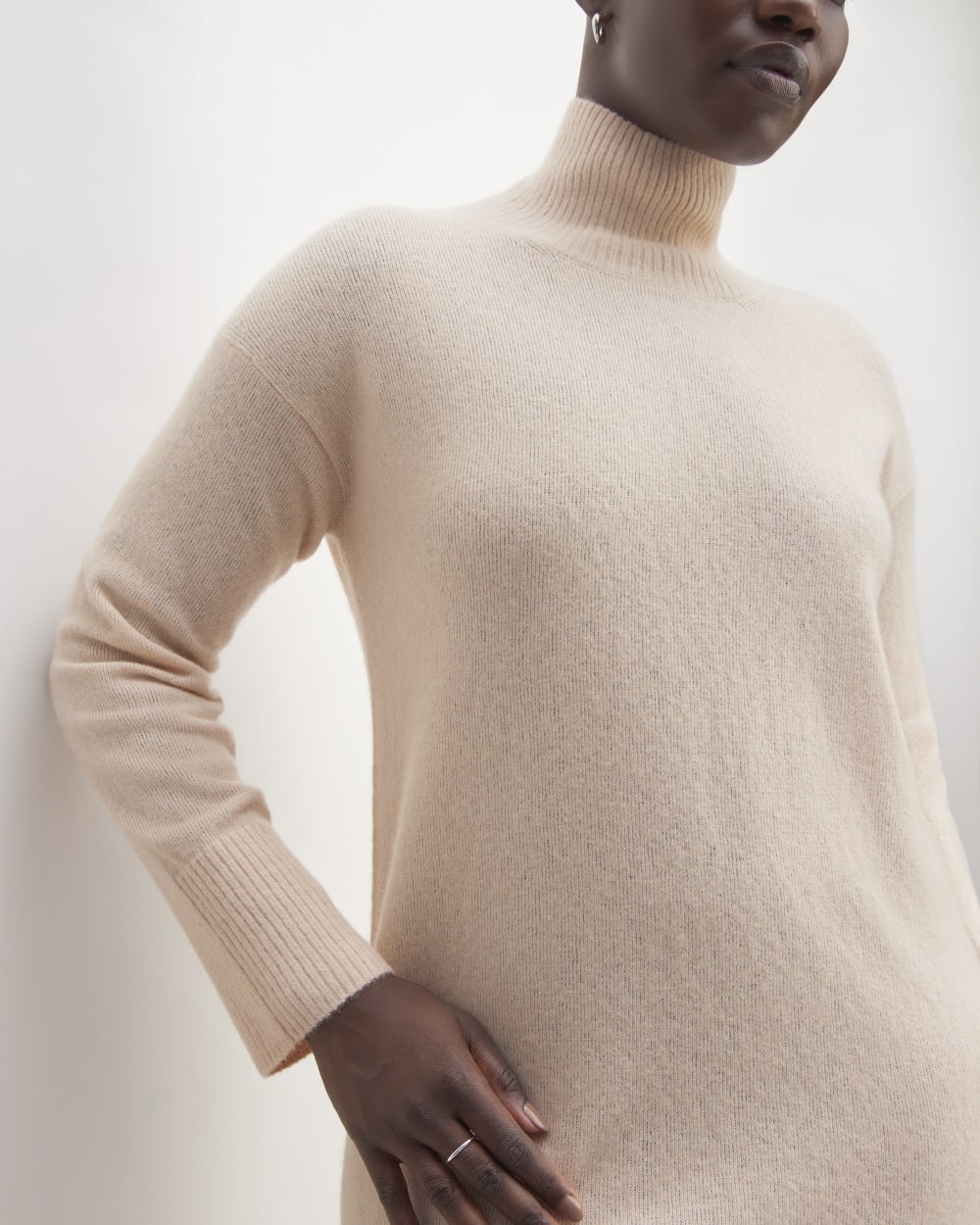 The Cozy Stretch Turtleneck Dress in Whisper Pink — detail view