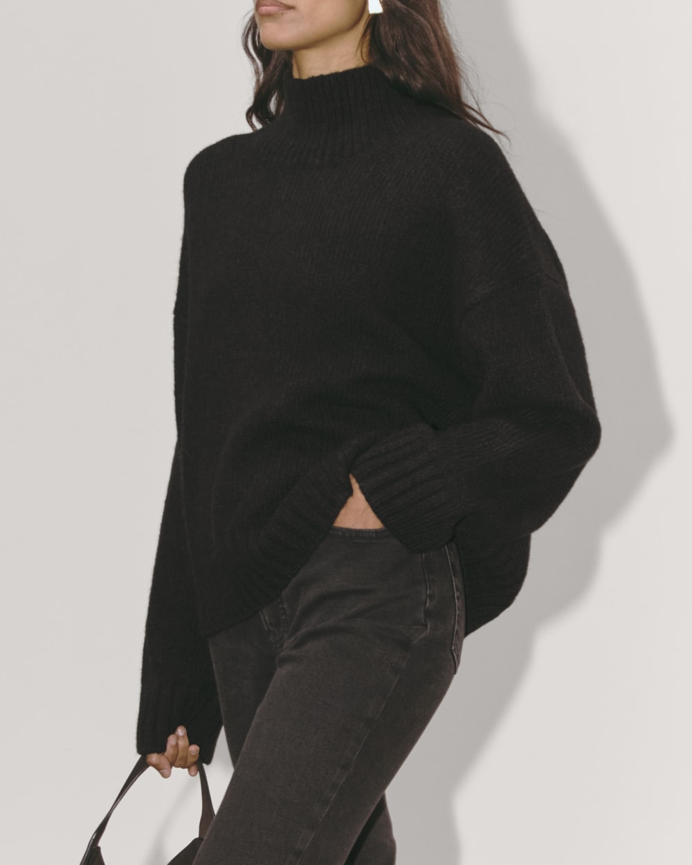 The Cloud Oversized Turtleneck in Black — detail view