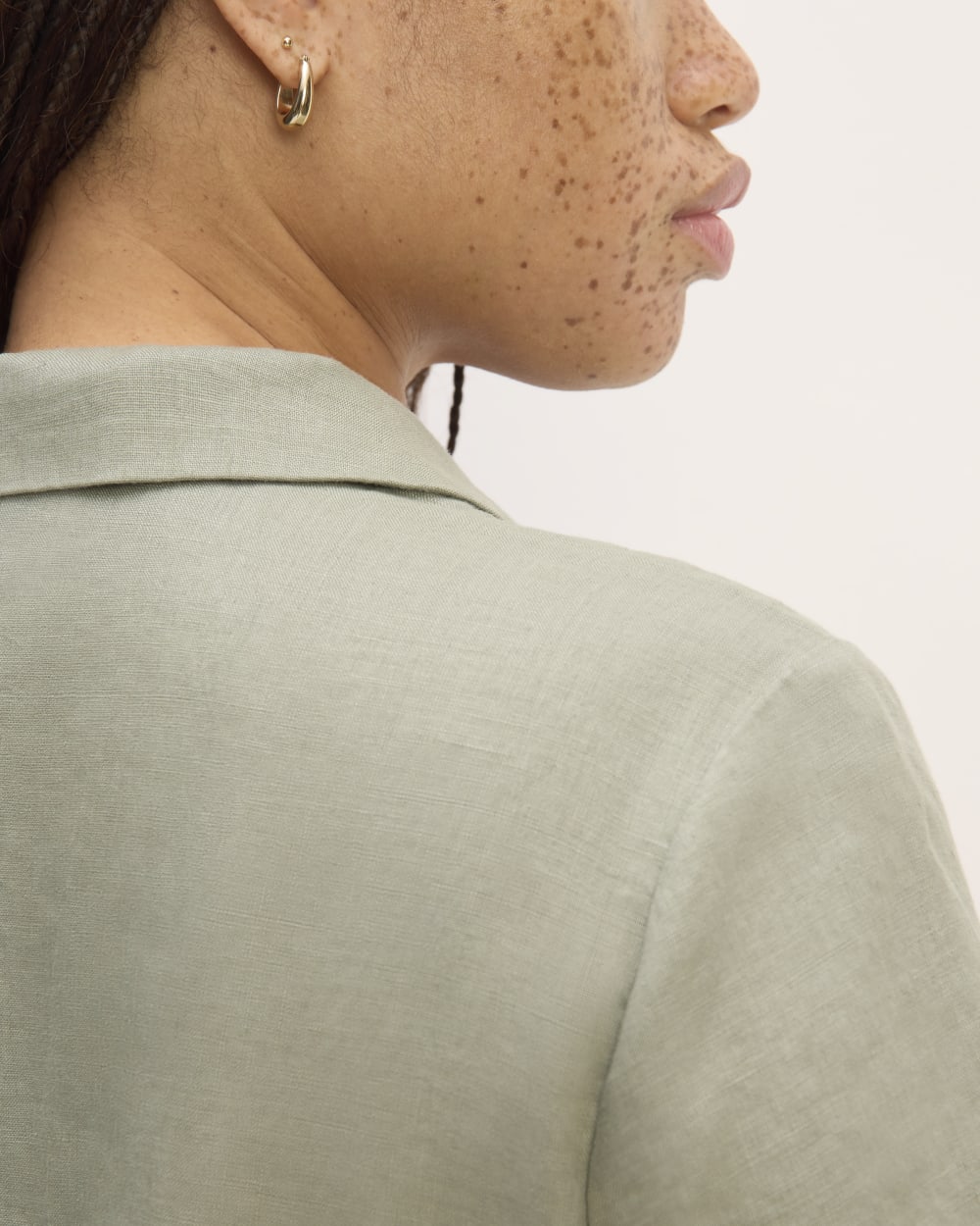 The Notch Shirt in Linen in Sage Green — detail view