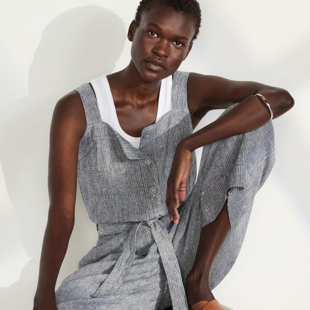 The Linen Jumpsuit in Canvas Tan / Navy — detail view