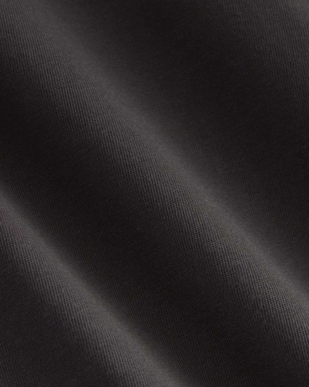 The Weekend Tank Dress in Washed Black — detail view