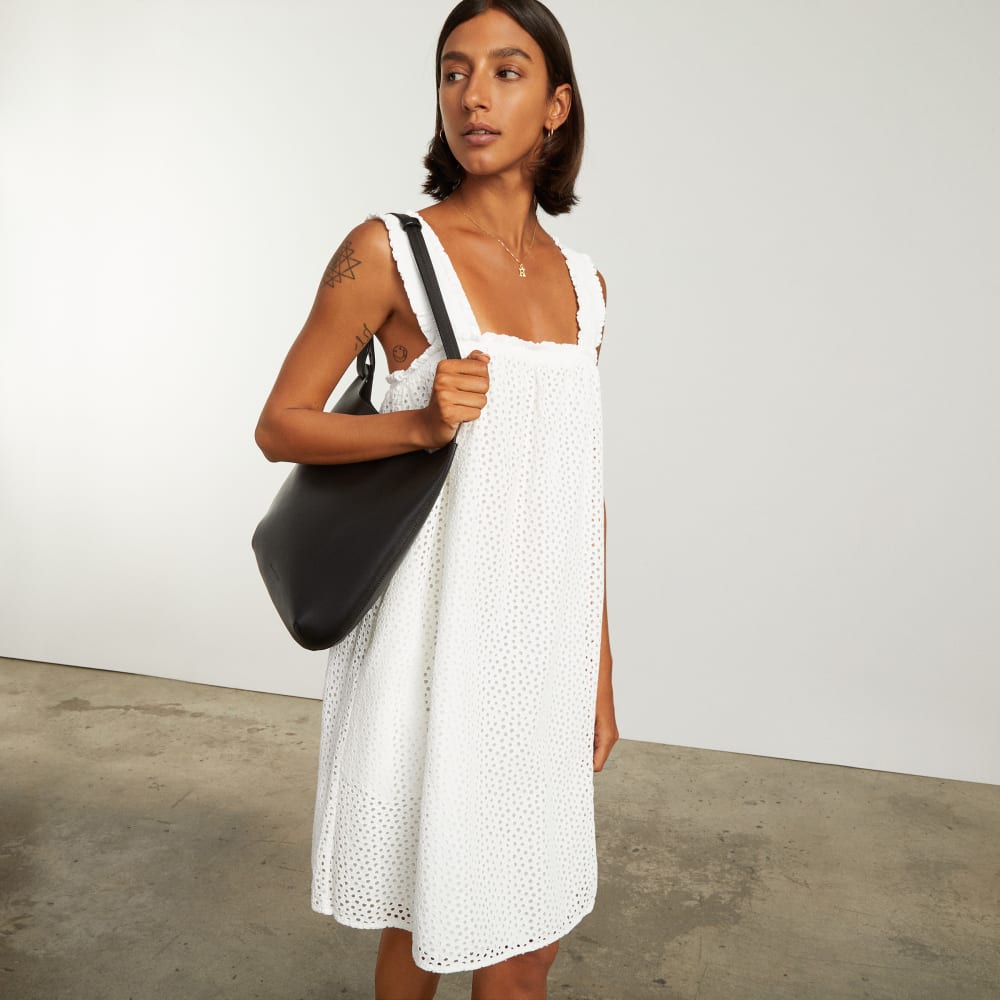 The Eyelet Smock Dress in White — detail view