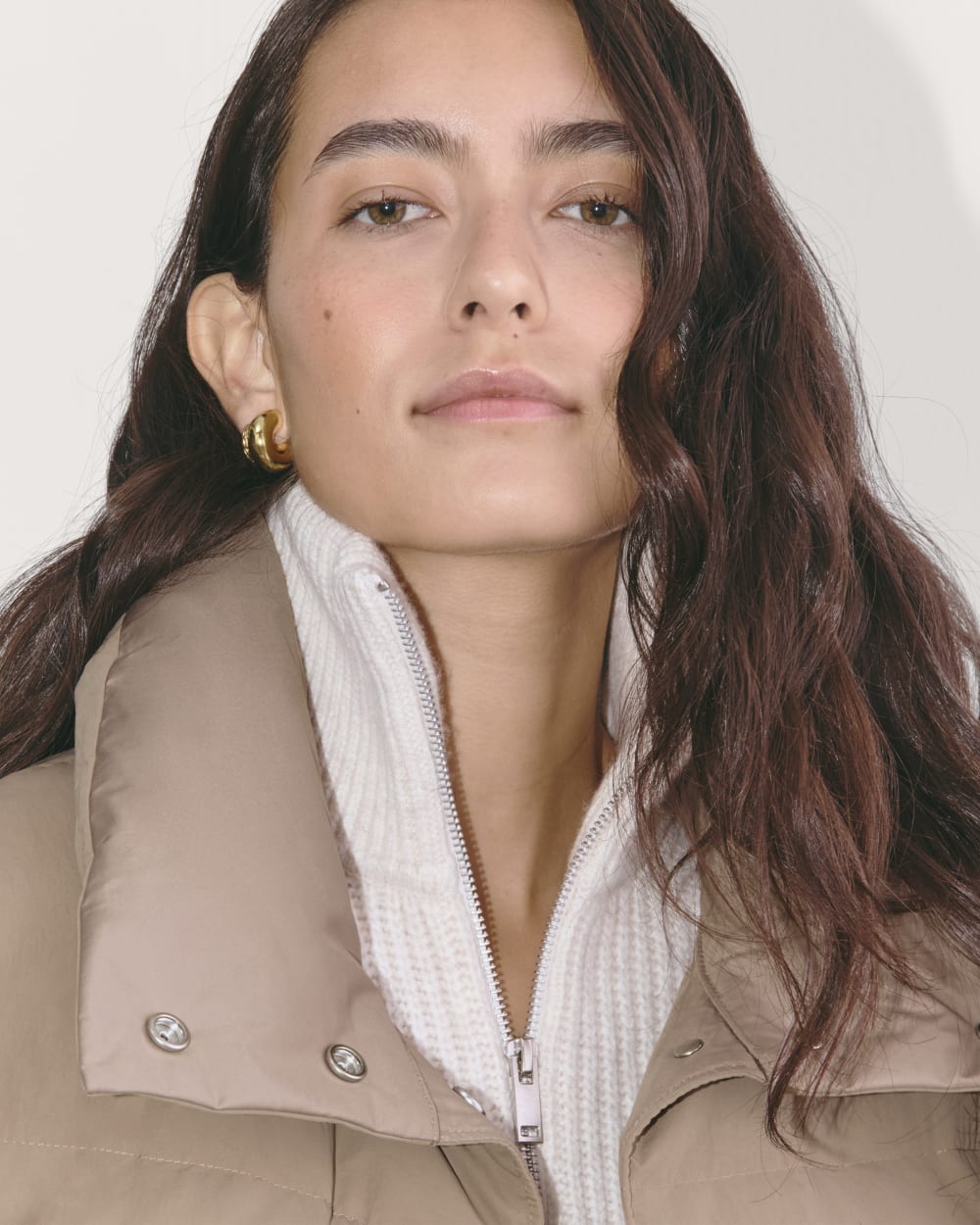 The Puffer Vest in Taupe Grey — detail view