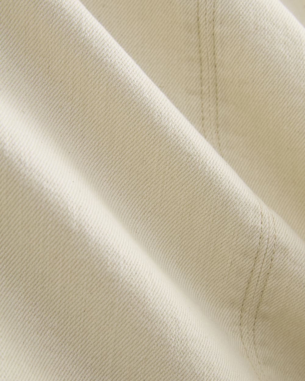 The Denim Shift Dress in Ecru — detail view