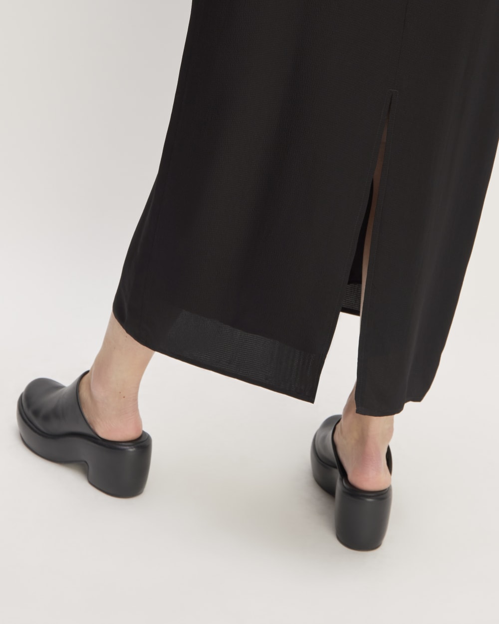 The Satin Racerback Slip Dress in Black — detail view