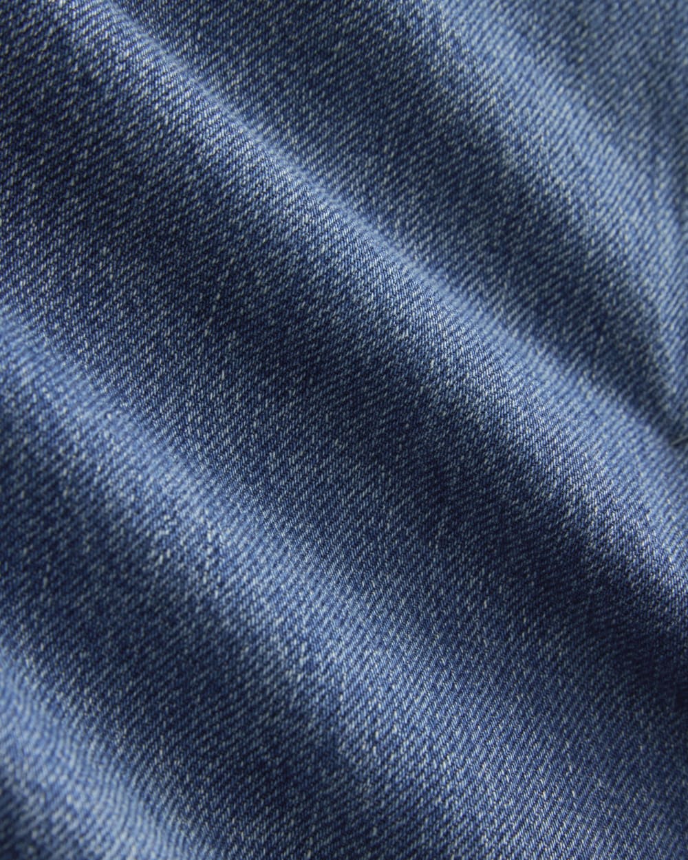 Cropped Denim Jacket in Medium Indigo — detail view
