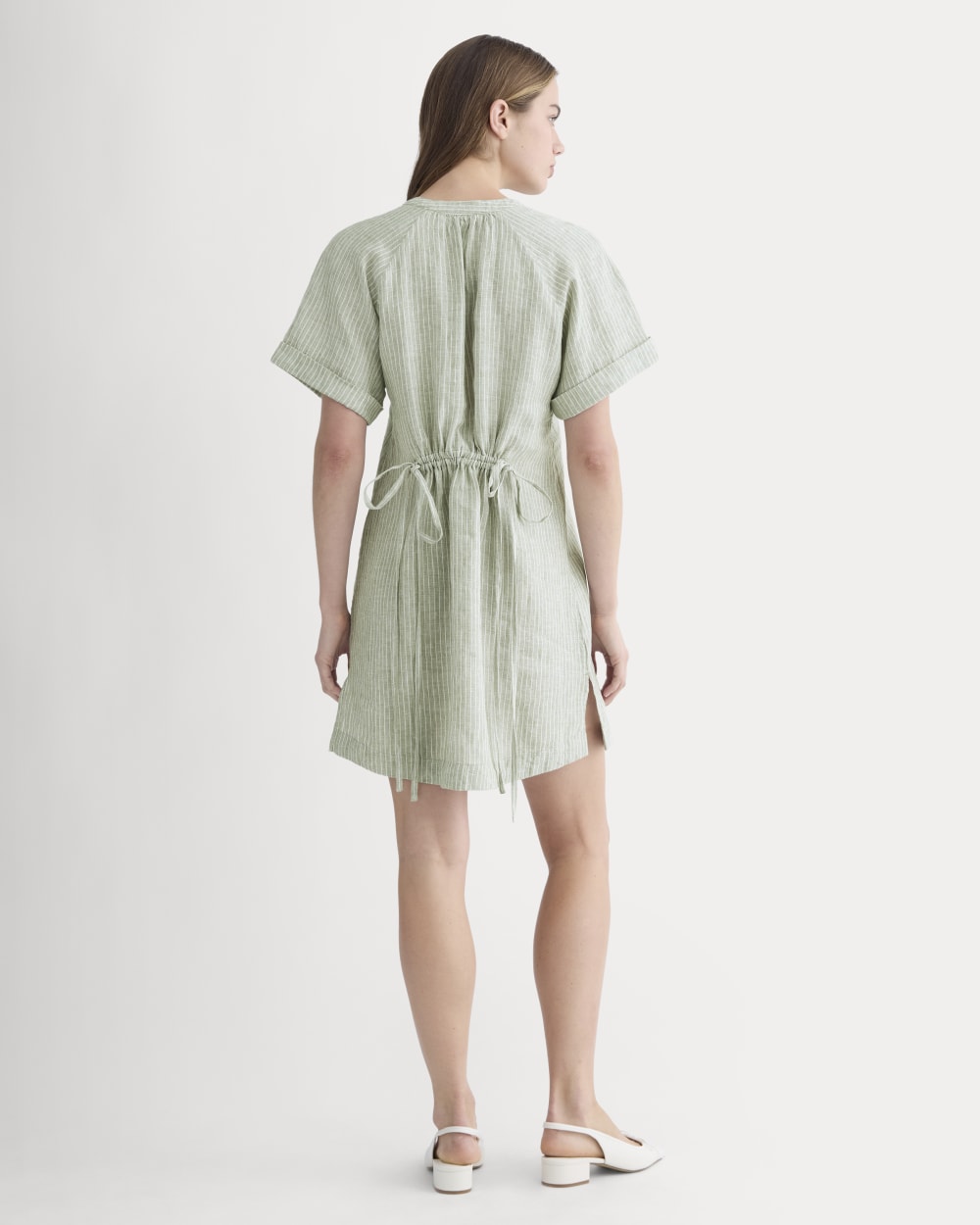 The Popover Dress in Linen in Oil Green / White — detail view