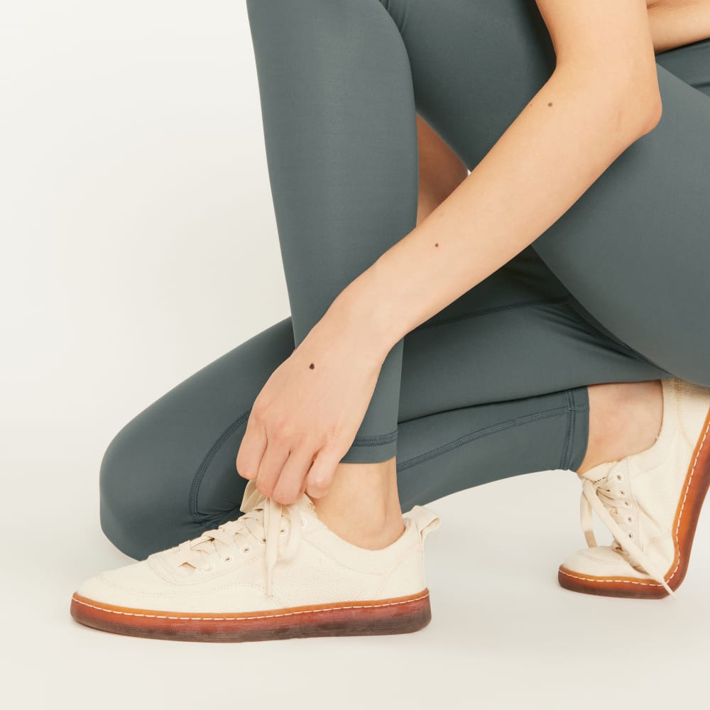 The Perform Legging® in Pine — detail view