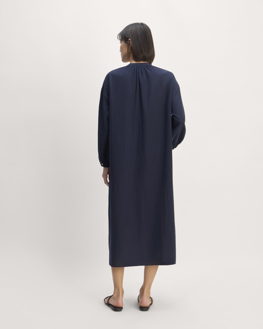 The Gauze Caftan Dress in Navy — detail view