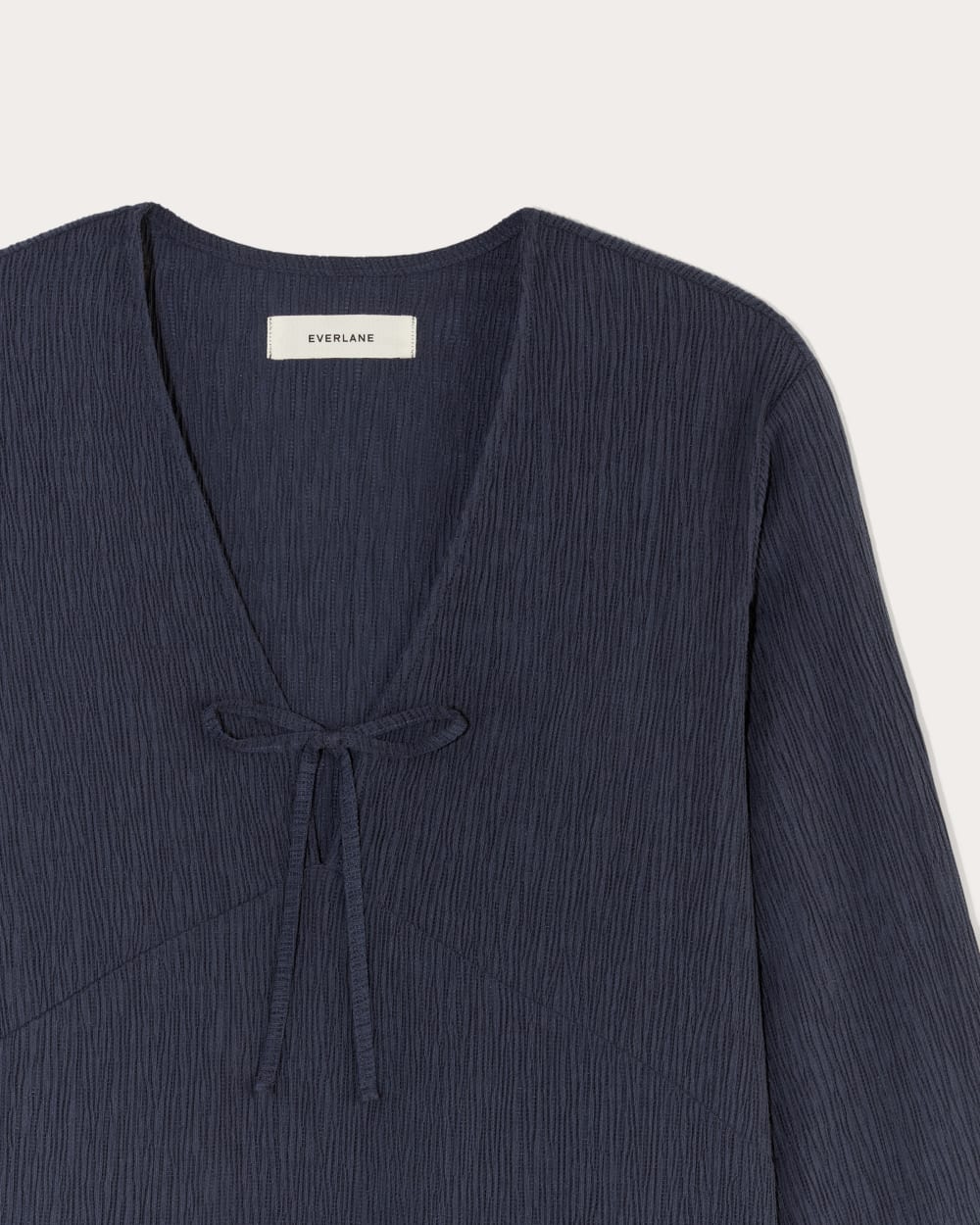 The Crinkle Long-Sleeve in Navy — detail view