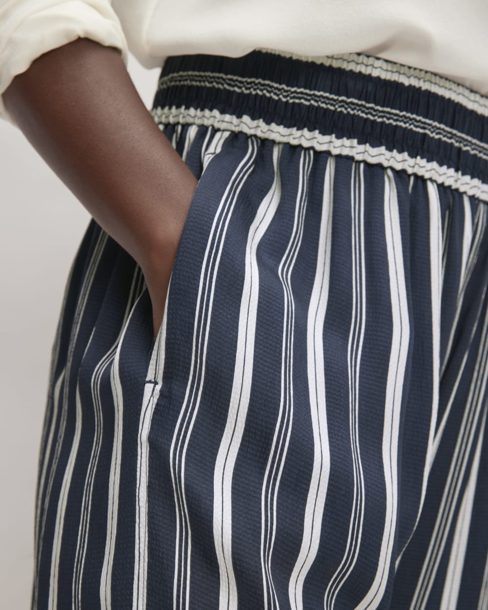 The Satin Pull-On Pant in Navy / Bone — detail view