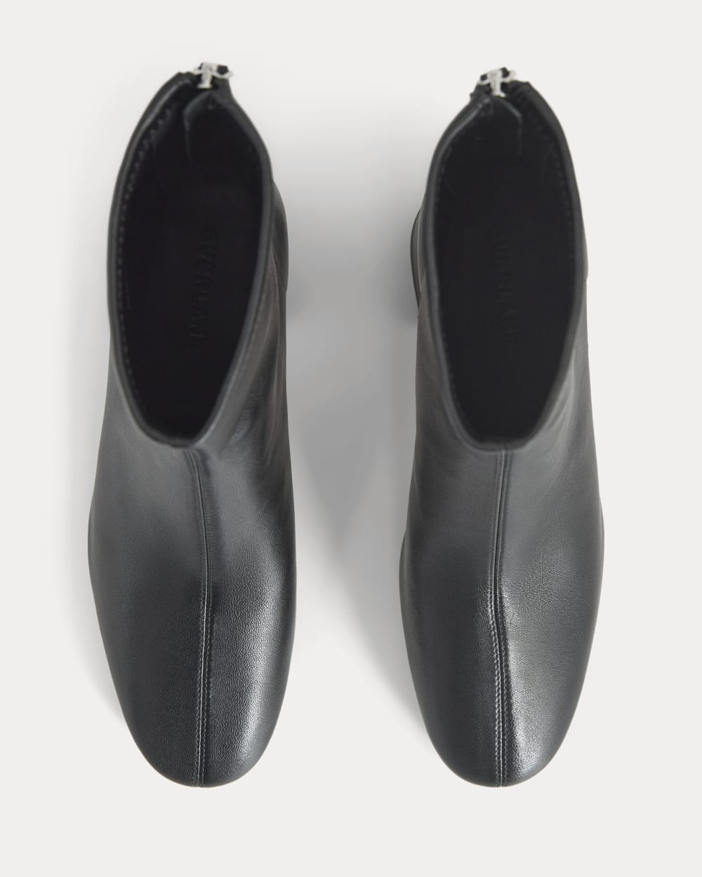 Leather Curved-Heel Boot in Black — detail view