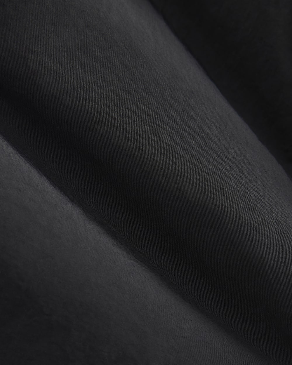 Renew Oversized Puffer Bomber in Black — detail view
