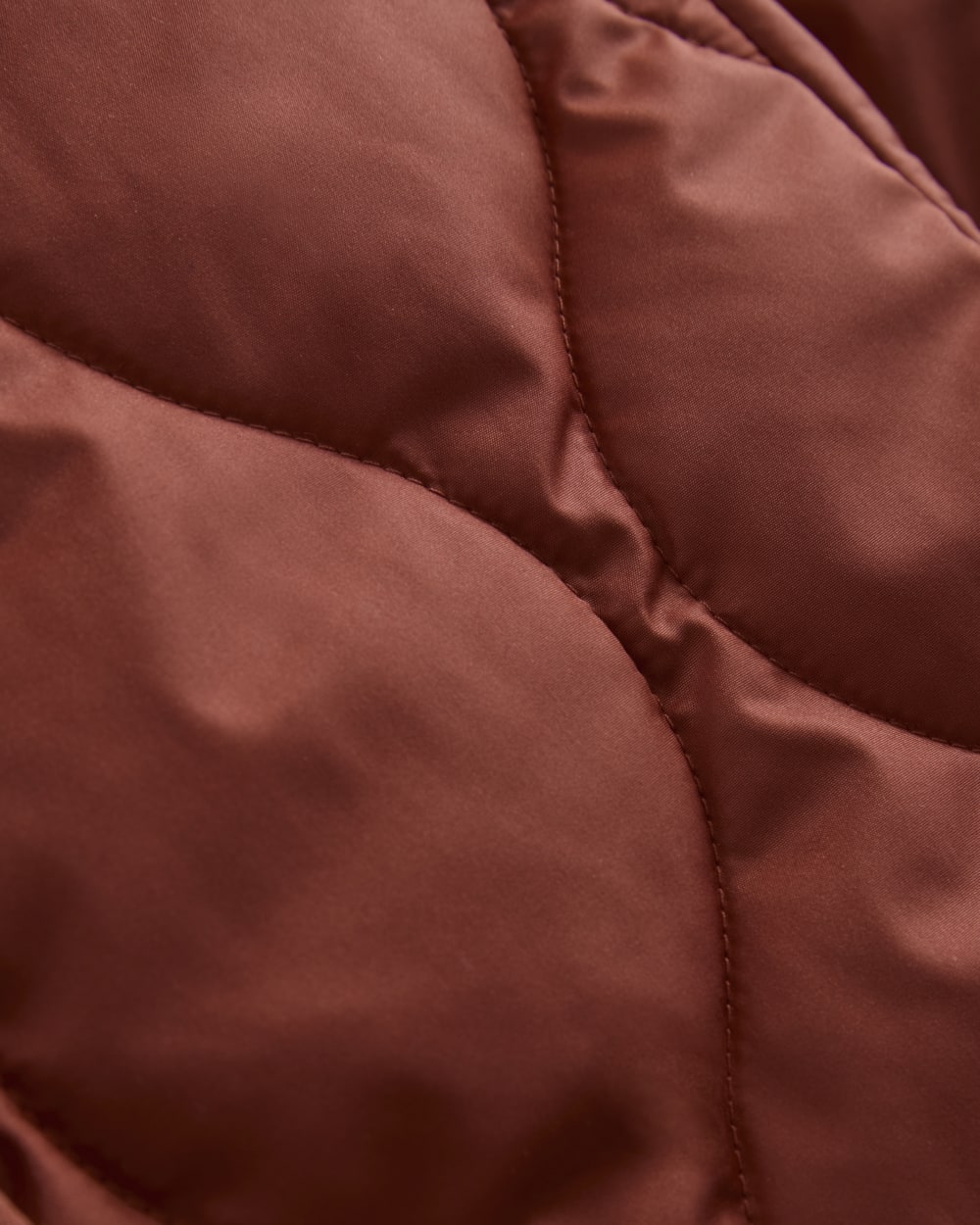 The Quilted Liner in Merlot — detail view