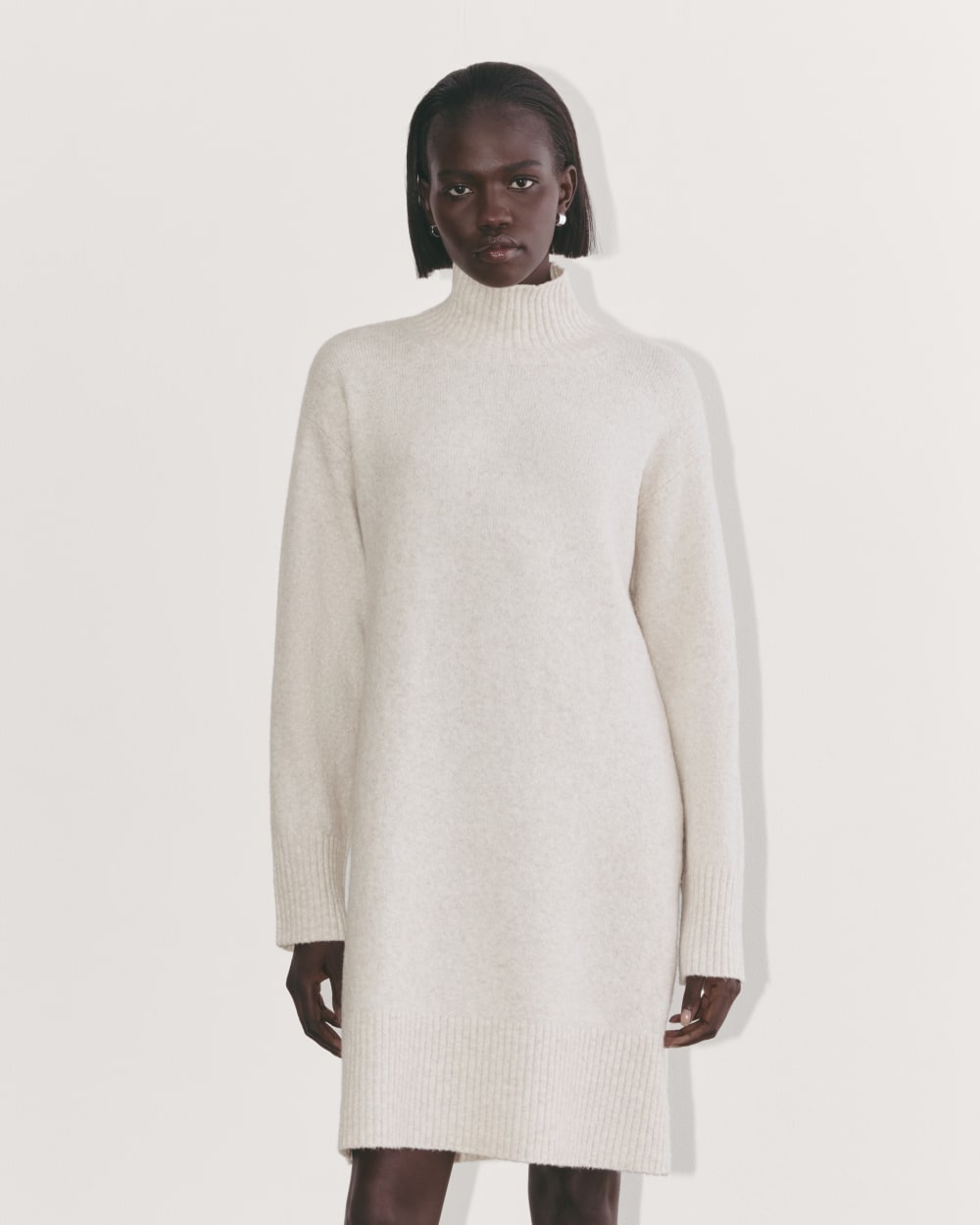 The Sweater Dress in Plush Cotton in Heathered Oat — front view