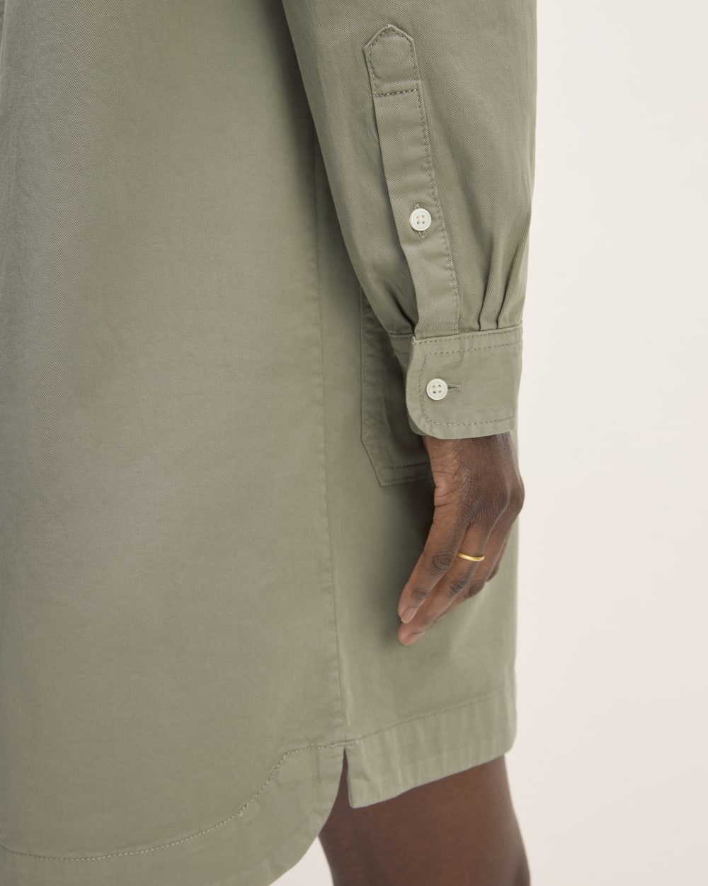 The Long-Sleeve Utility Mini Dress in Sage Green — detail view