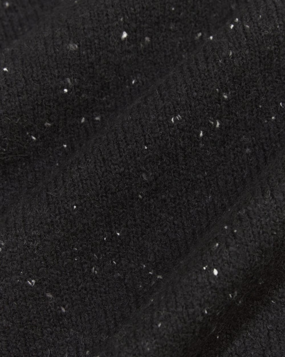 The V-Neck Sweater in Plush Cotton in Black Confetti — detail view