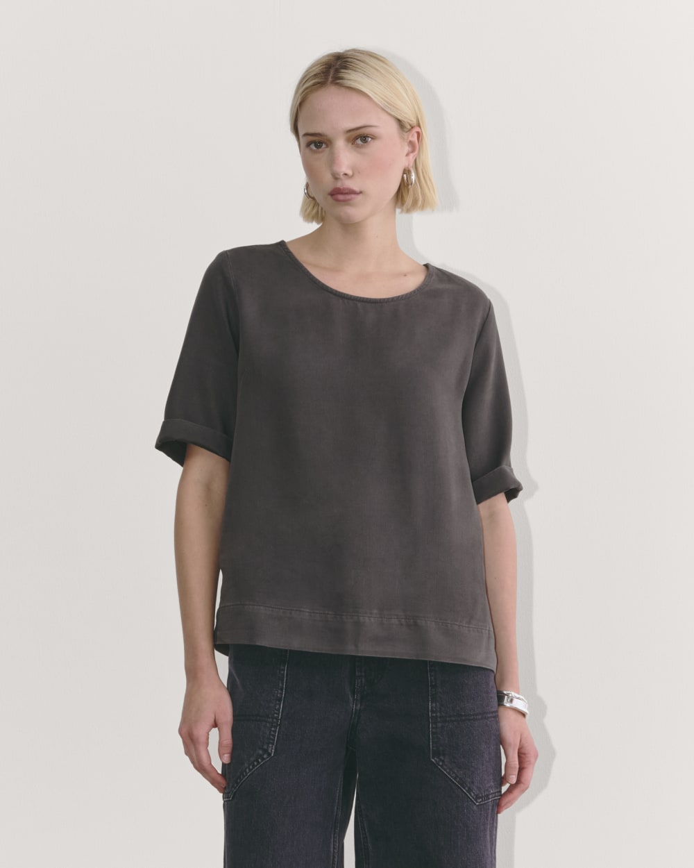 The Relaxed Tee in Buttersoft in Graphite — front view
