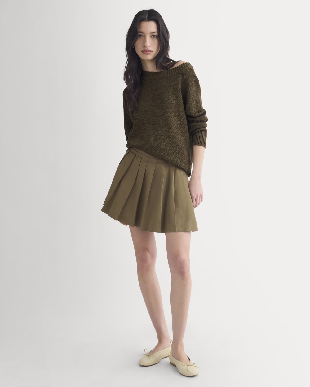 Utility Pleated Mini Skirt in Olive — front view