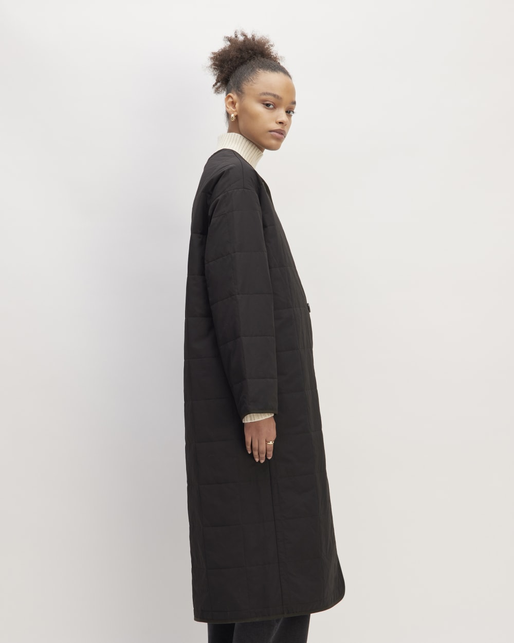 The ReNew Quilted Long Liner in Black — detail view