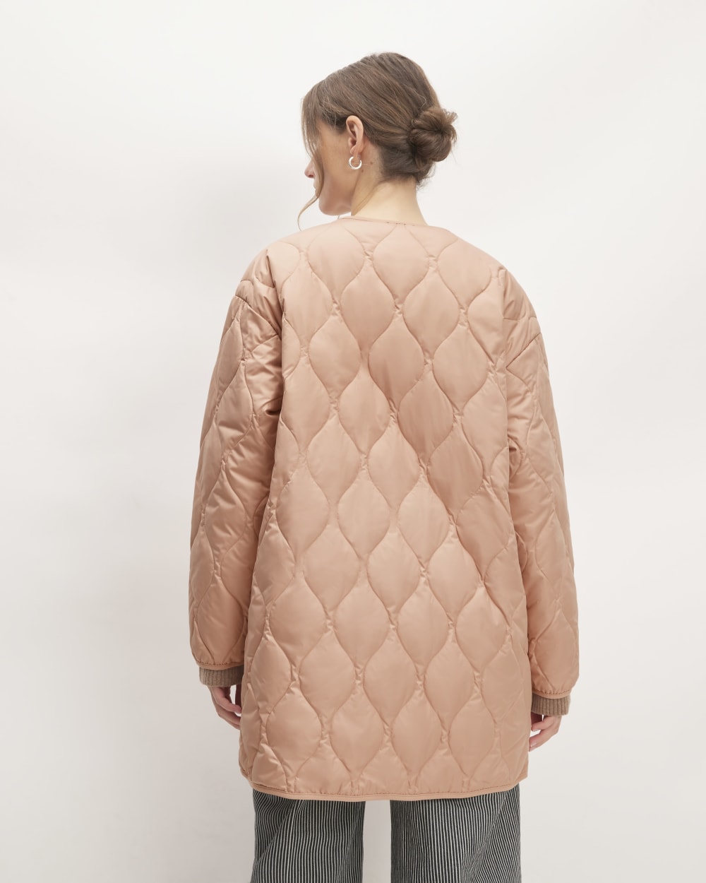 The Quilted Liner in Blush Pink — detail view