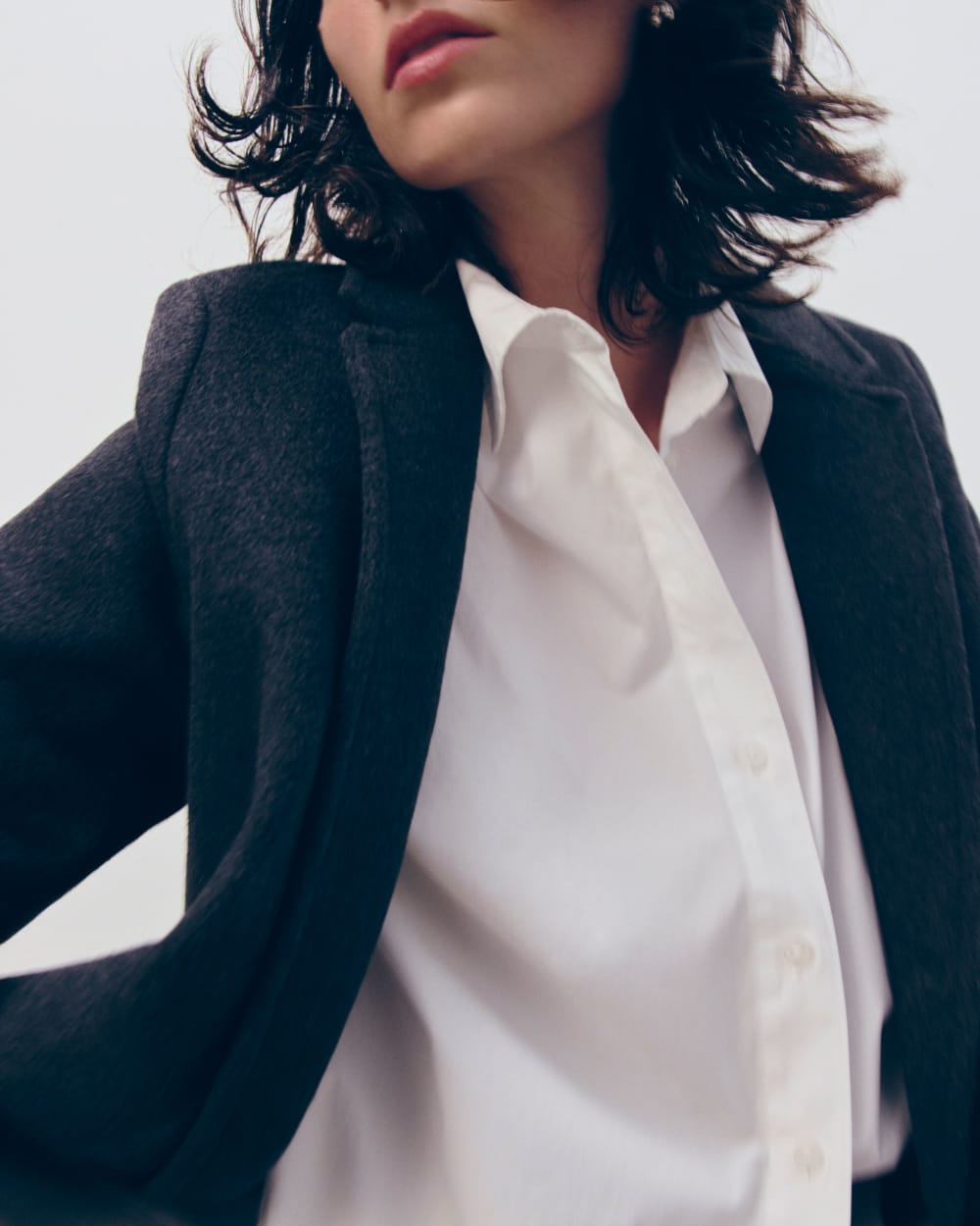 The Topcoat in Wool in Dark Charcoal Melange — detail view
