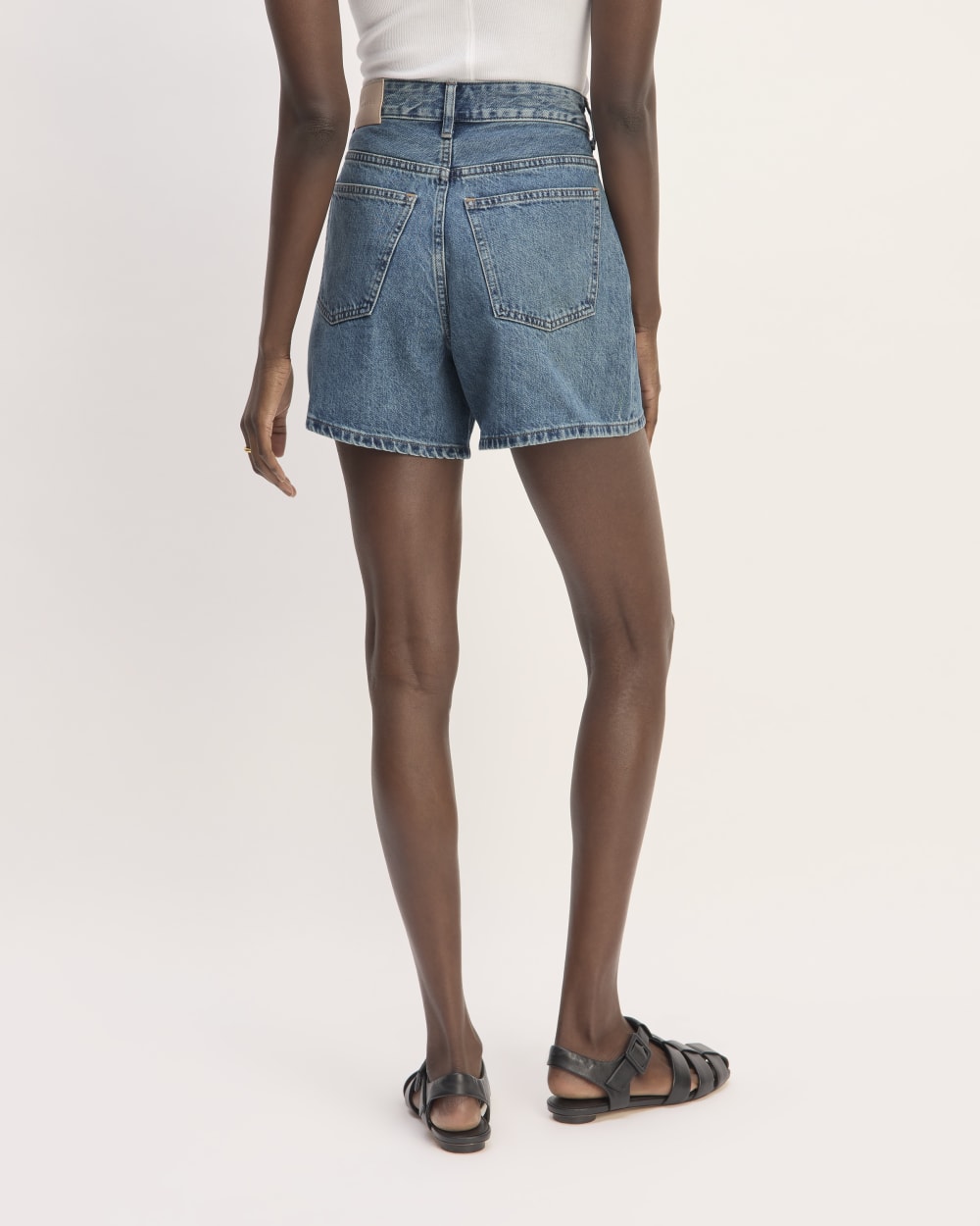 The A-Line Denim Short in Mid Blue — detail view