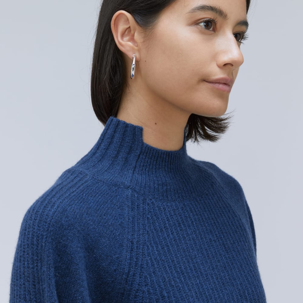 The Cashmere Ribbed Turtleneck in Bright Navy — detail view