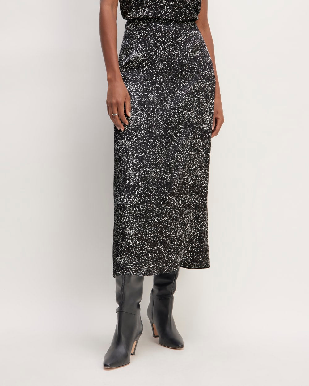 The Hammered Satin Slip Skirt in Black Moonsplatter — detail view
