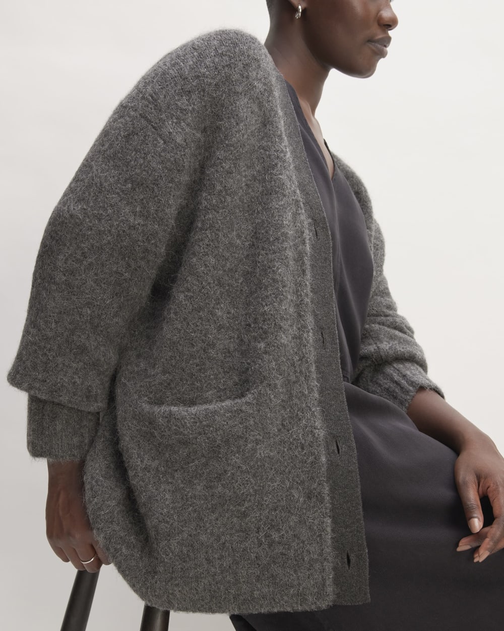 The SuperFuzz Alpaca Cardigan in Dark Charcoal — detail view