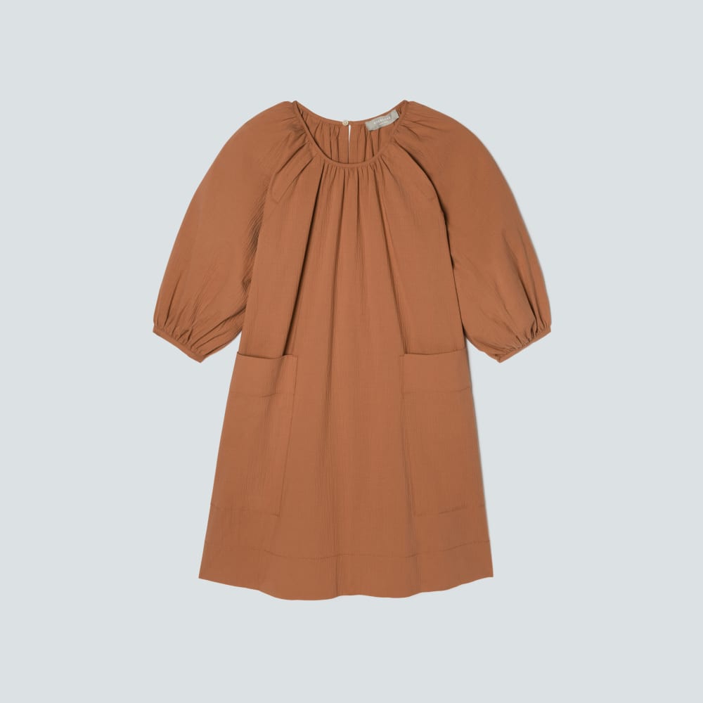 The Seersucker Puff Sleeve Dress in Tawny Brown — front view