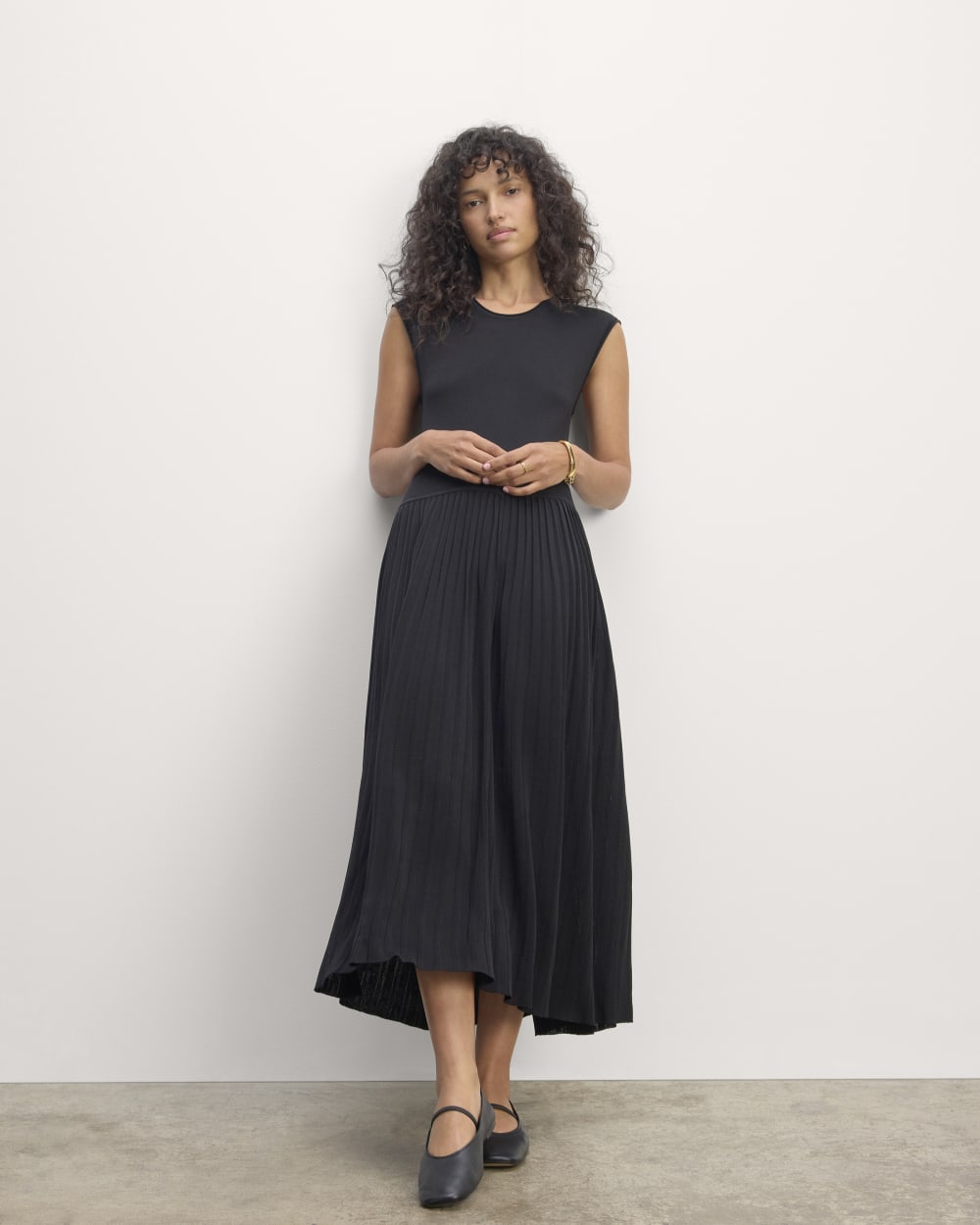 The Knit Pleated Dress in Black — front view