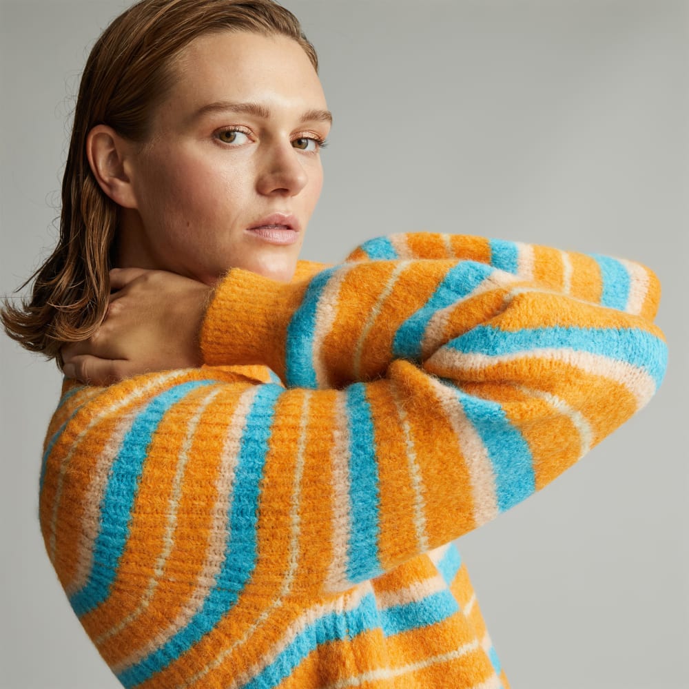 The SuperFuzz Alpaca Oversized Crew in Turmeric Stripe — detail view