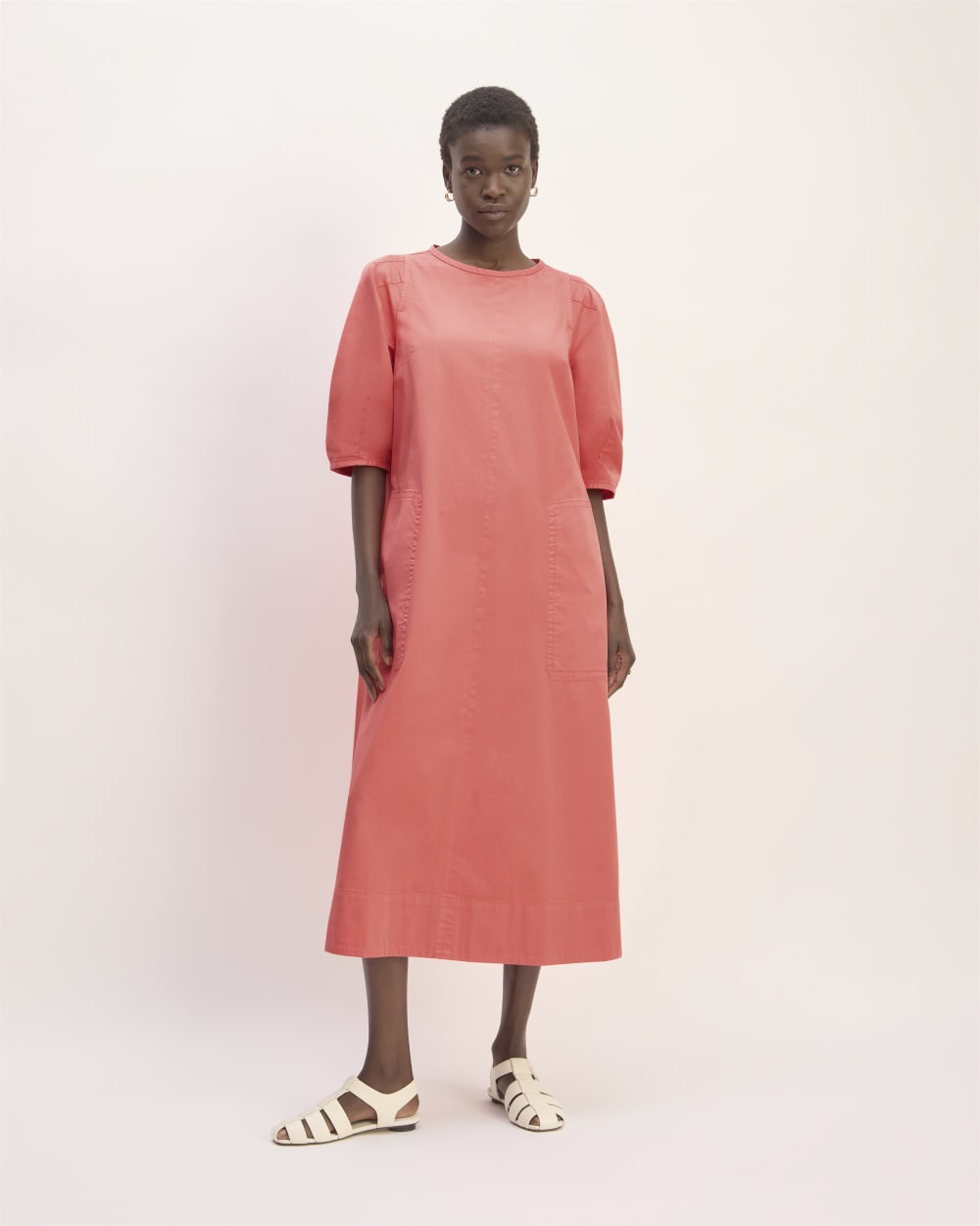 The Short-Sleeve Puff Midi Dress in Coral — front view