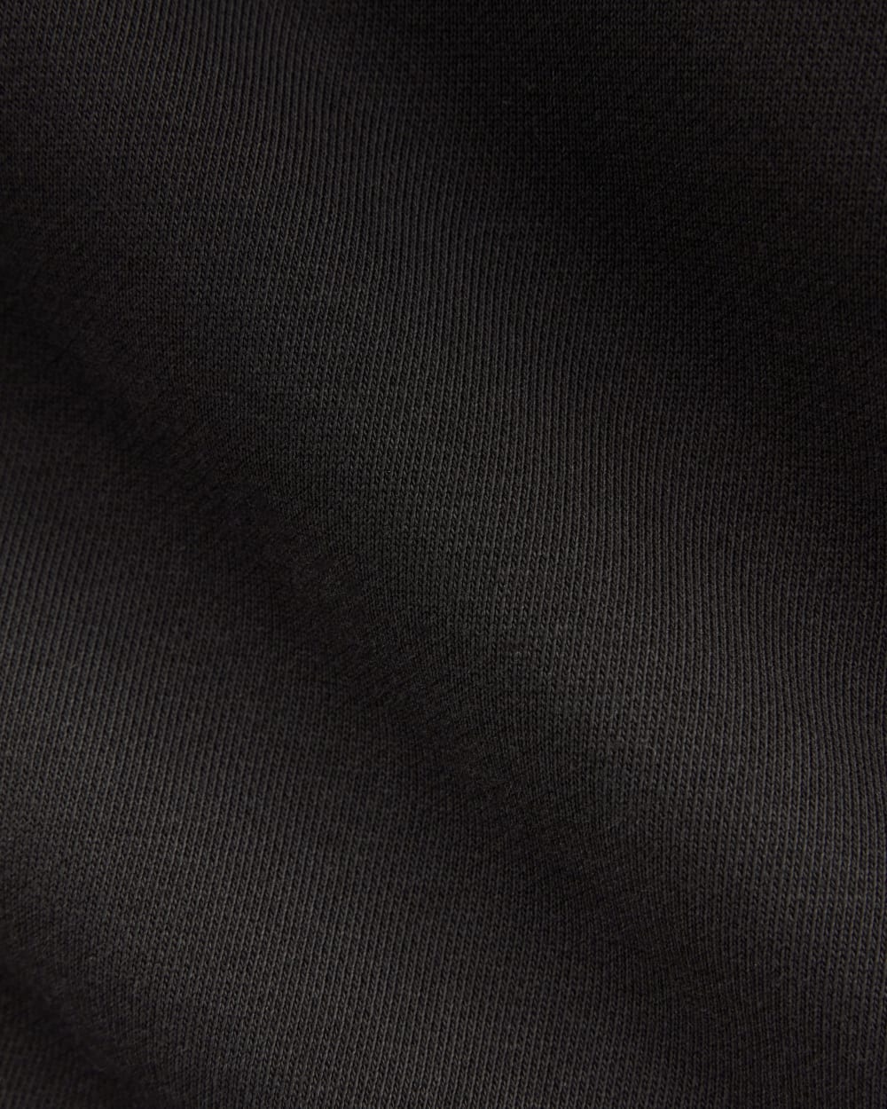 The Off-Duty Jogger in Black — detail view