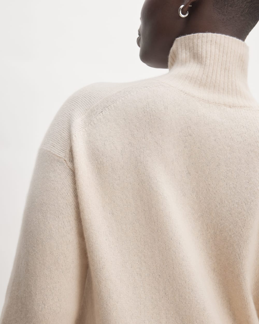 The Cozy Stretch Turtleneck Dress in Whisper Pink — detail view