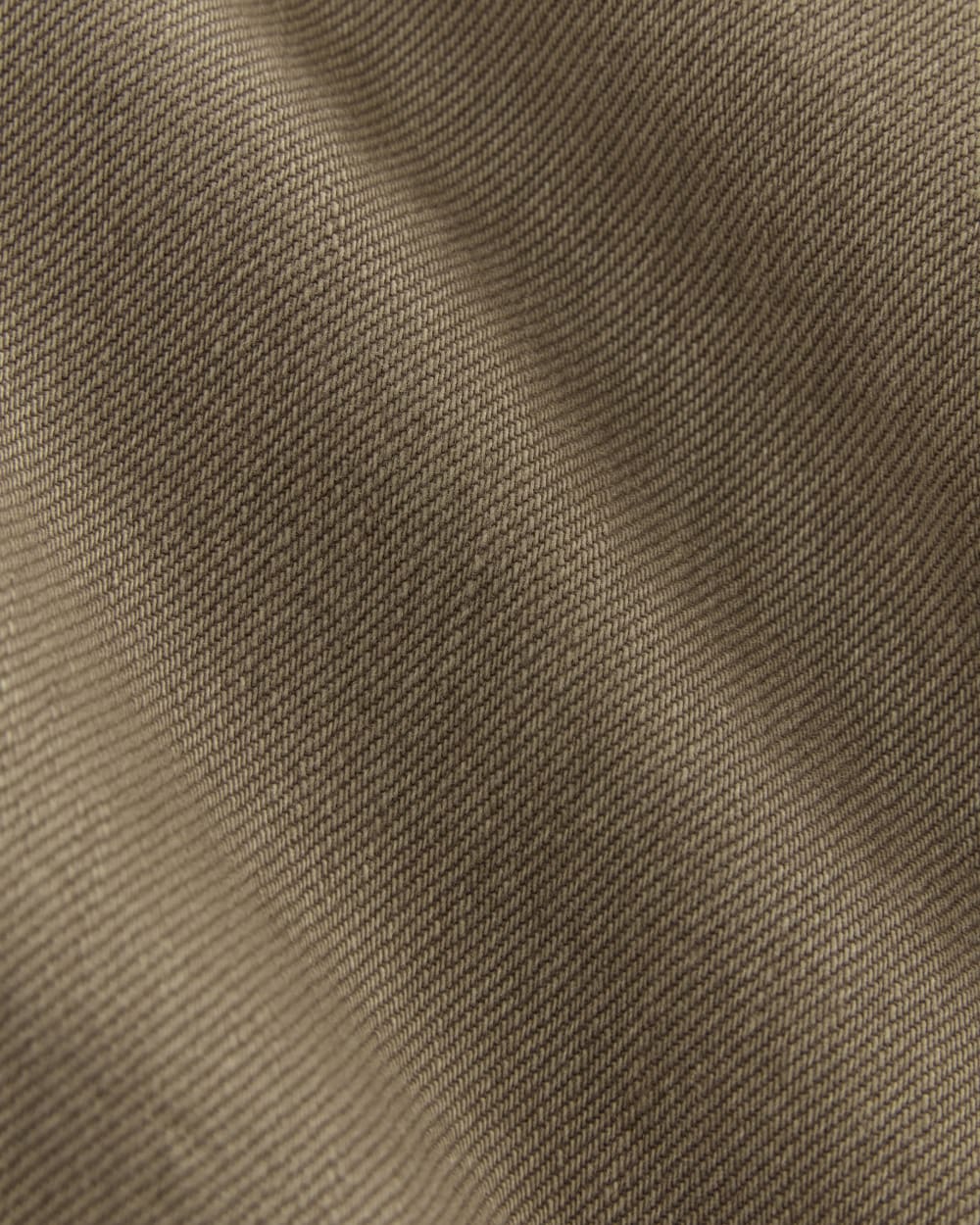 The Long Denim Barrel Jacket in Garment-Dyed Chocolate — detail view
